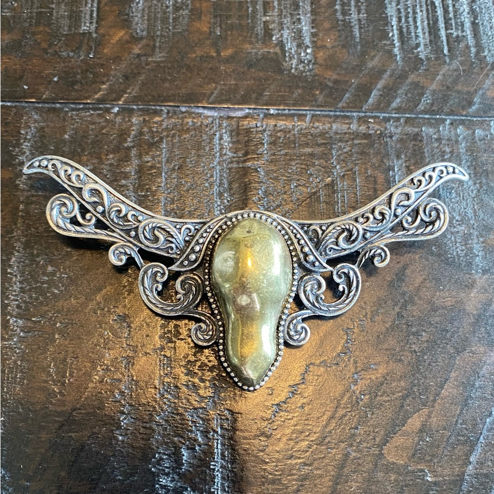 Ornate Silver-Tone Pendant with Brass Center